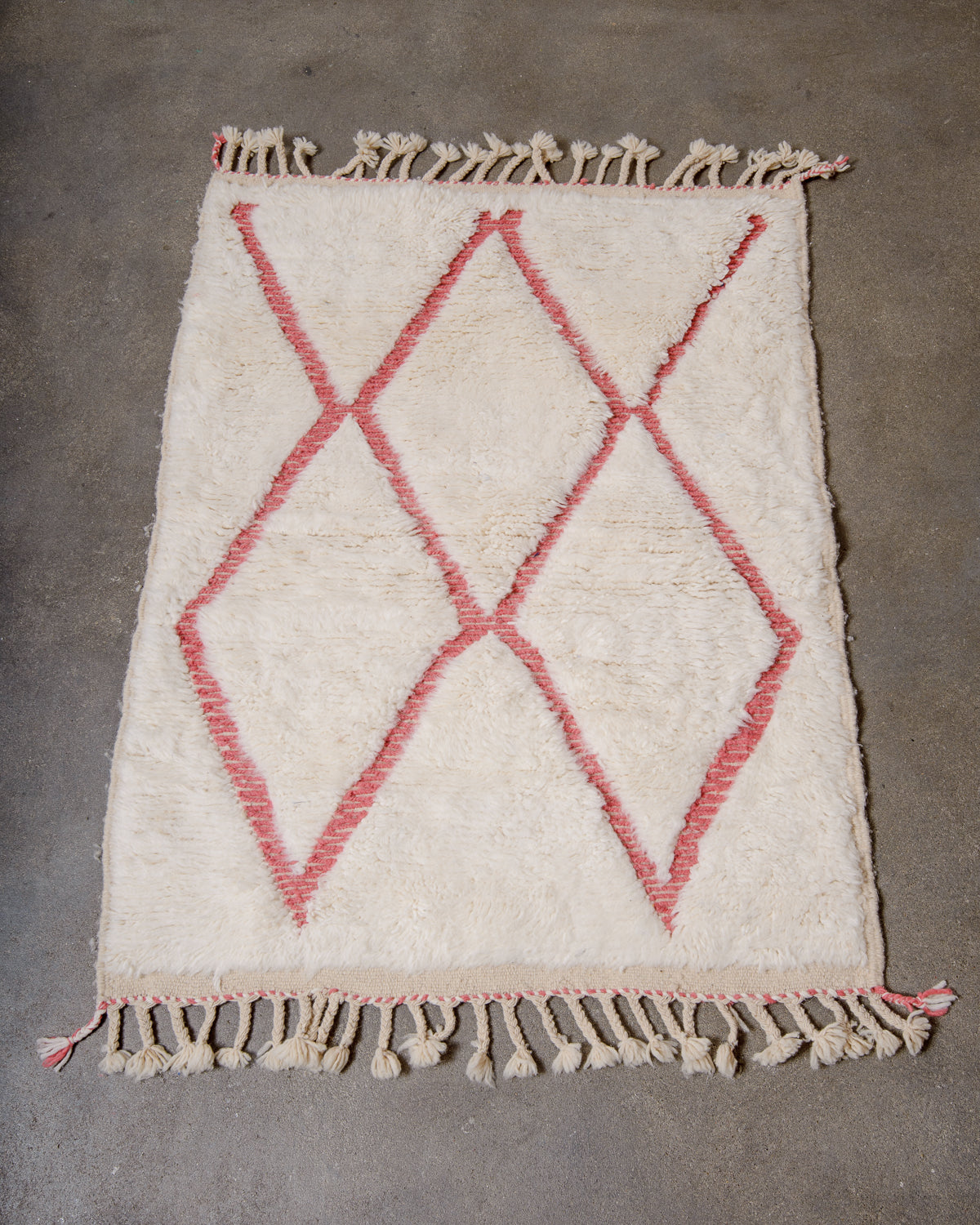 Modern, designer, handcrafted Berber rug from Morocco. Beniourain carpet with minimalist design, natural wool pile and a fluffy texture.